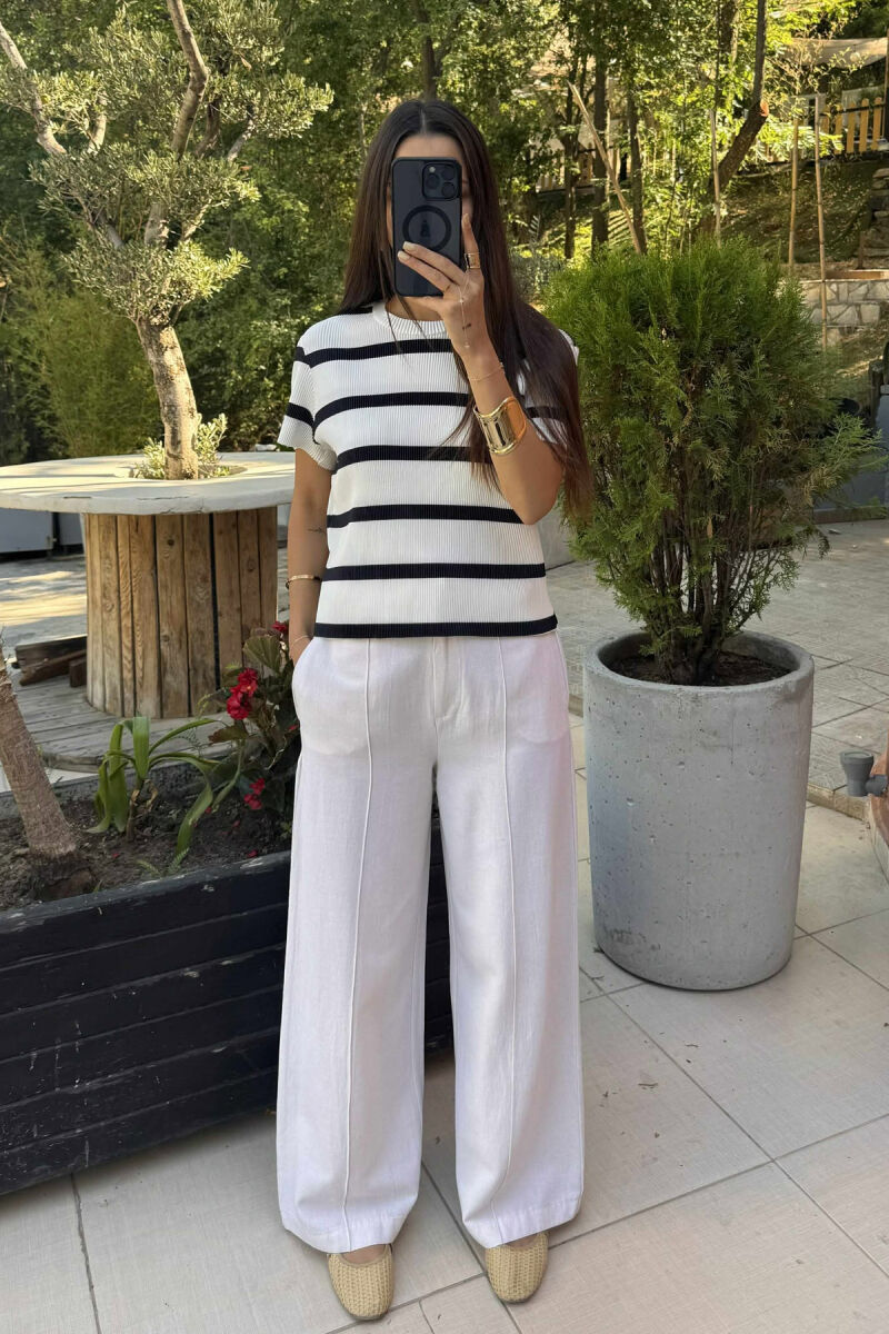 T-SHIRT ME DIZAJNIN E VIJAVE PËR FEMRA NË NGJYRËN E BARDHË DHE E ZEZË - 1