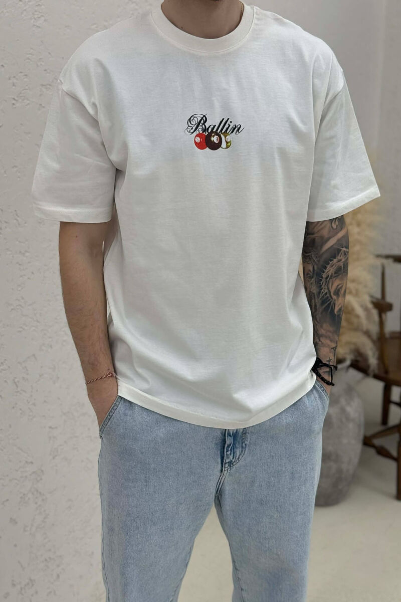 T-SHIRT ME IMAZH NE PJESEN PAS PER MESHKUJ NE NGJYRE KREM - 2