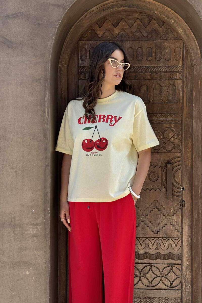 T-SHIRT ME IMAZHIN E QERSHISË PËR FEMRA NË NGJYRËN E VERDHË - 2