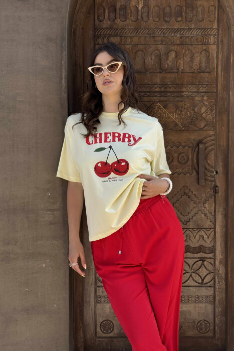 T-SHIRT ME IMAZHIN E QERSHISË PËR FEMRA NË NGJYRËN E VERDHË - 4