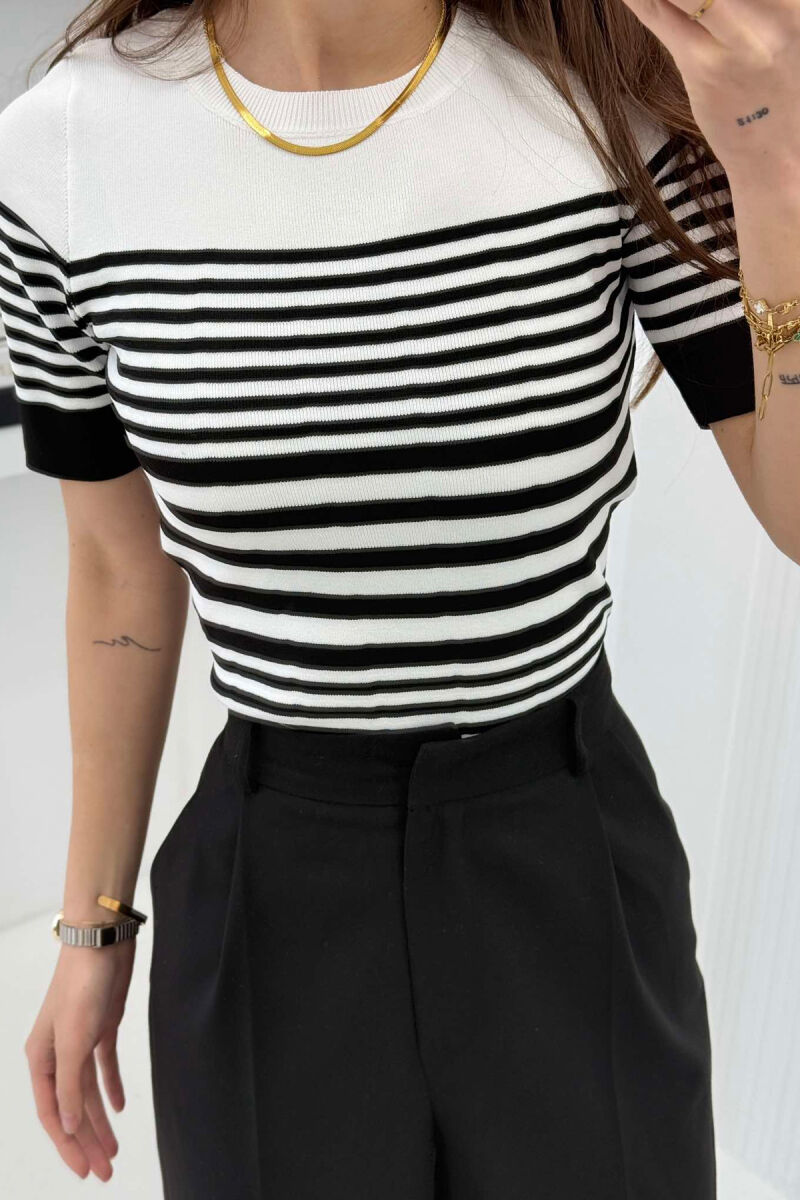 T-SHIRT ME VIJA PËR FEMRA NË NGJYRËN E BARDHË ME TË ZEZË - 4