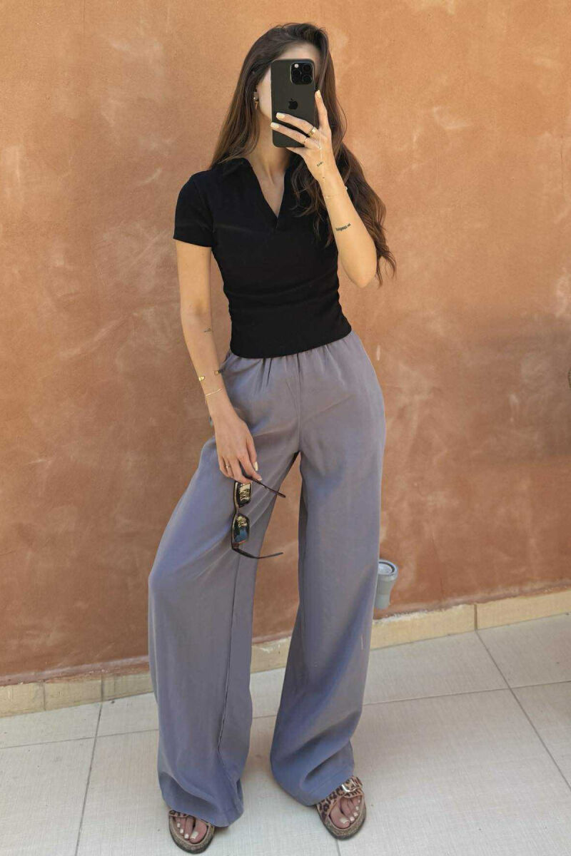 T-SHIRT NJË NGJYRËSH I THJESHTË ME JAKË POLO PËR FEMRA NË NGJYRËN E ZEZË - 1