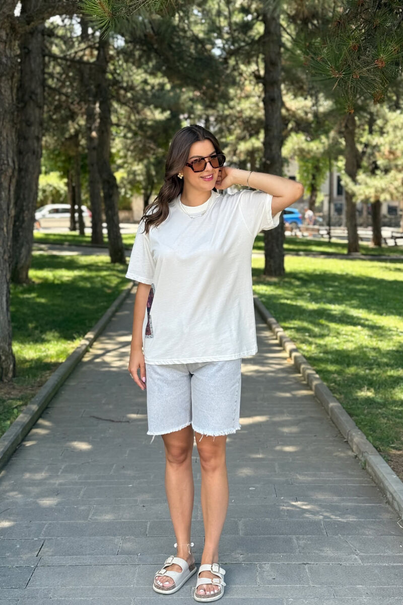 T-SHIRT NJË NGJYRËSH ME DIZAJN PËR FEMRA NË NGJYRËN E BARDHË - 1