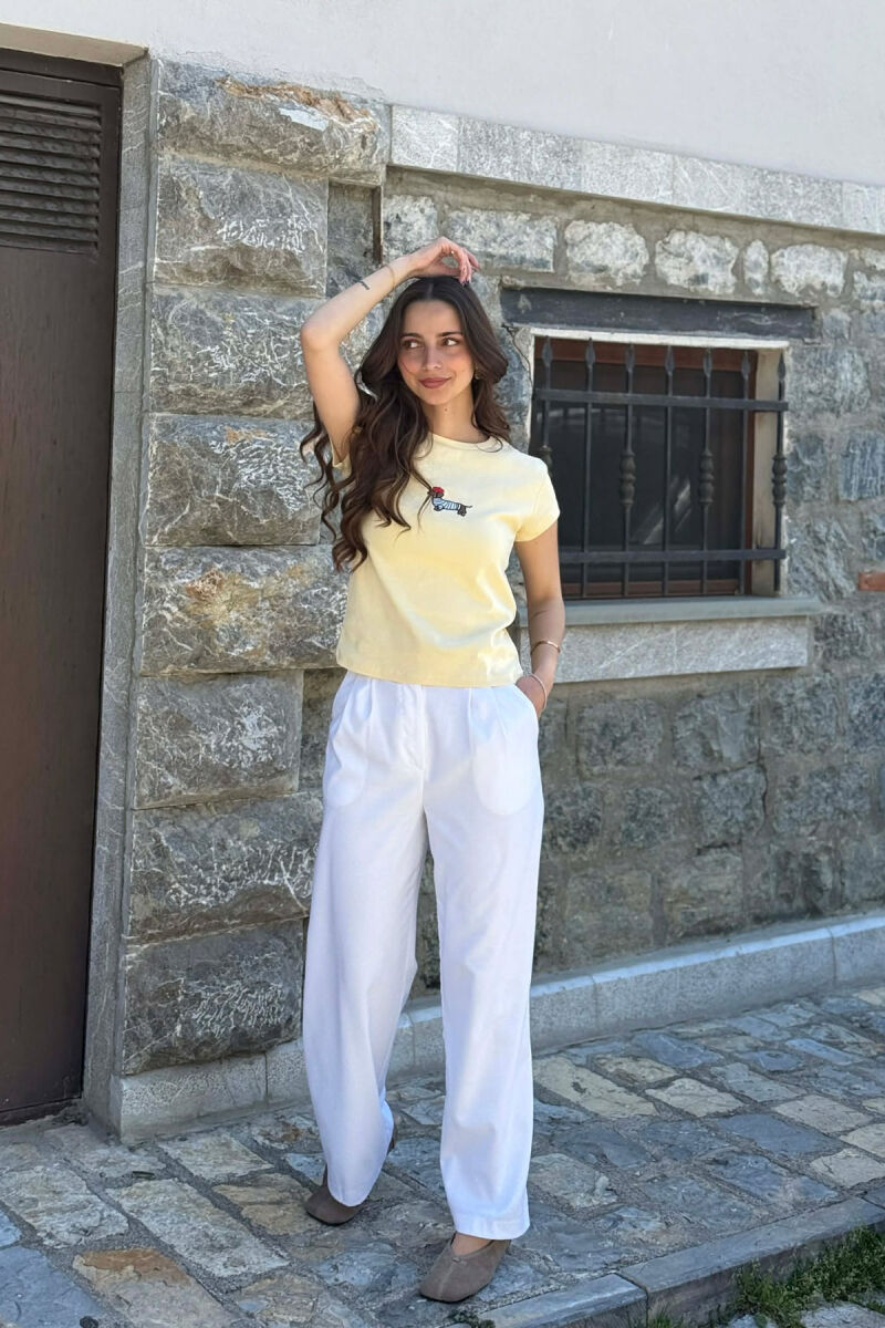 T-SHIRT NJE NGJYRESH ME IMAZH NE PJESEN PARA PER FEMRA NE NGJYRE TE VERDHE - 2