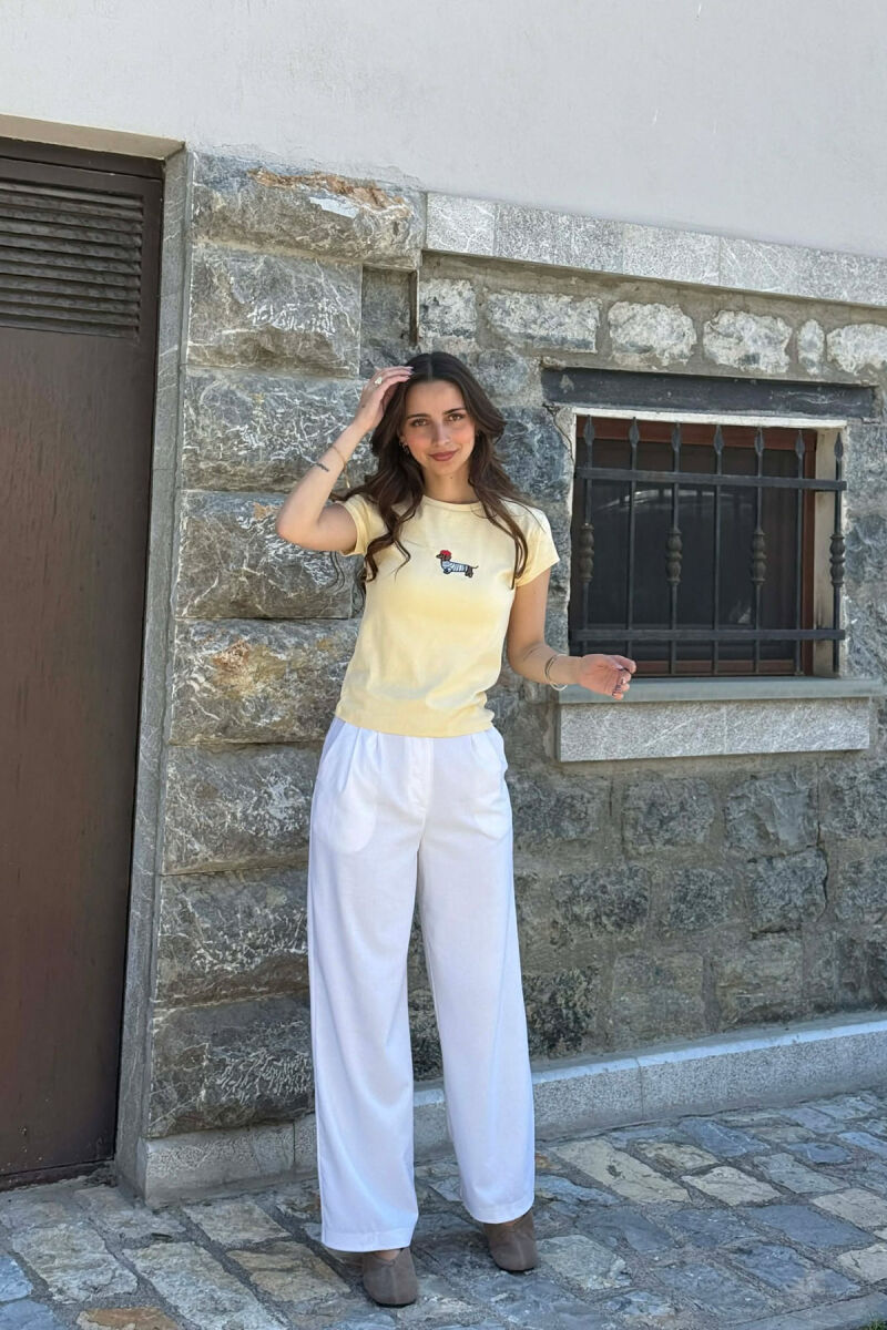 T-SHIRT NJE NGJYRESH ME IMAZH NE PJESEN PARA PER FEMRA NE NGJYRE TE VERDHE - 4