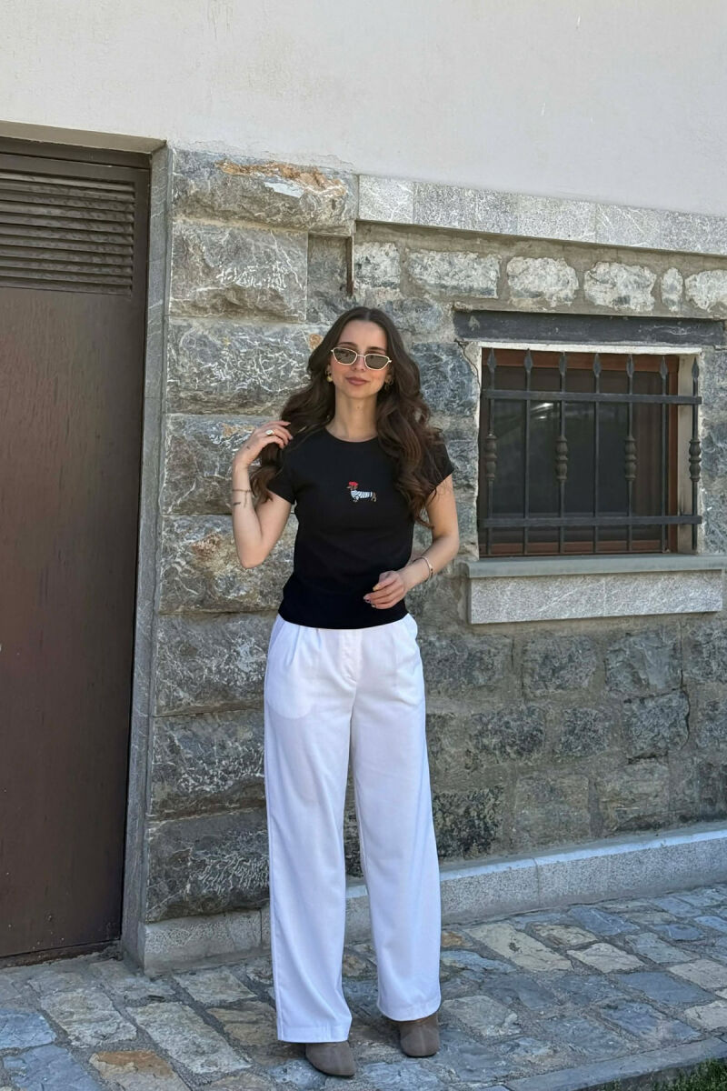 T-SHIRT NJE NGJYRESH ME IMAZH NE PJESEN PARA PER FEMRA NE NGJYRE TE ZEZE - 4