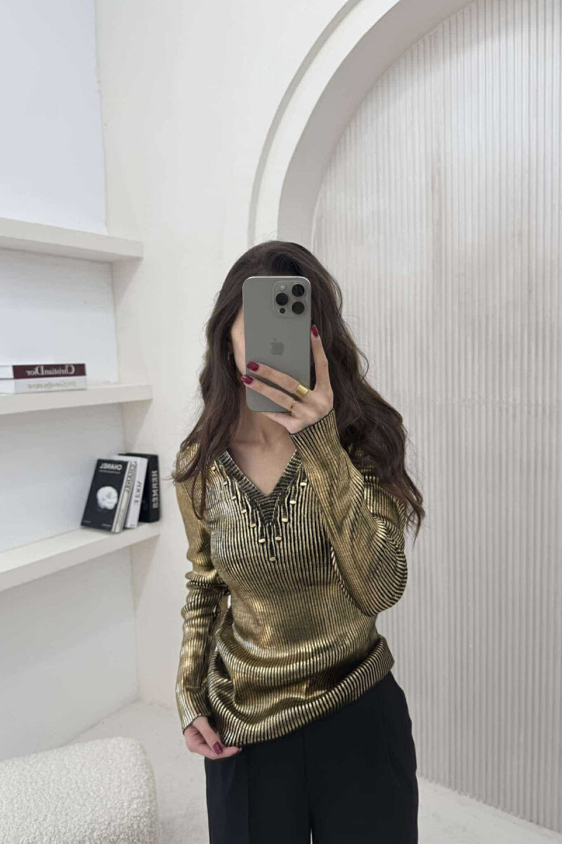 TRIKO E SHNDRITSHME PËR FEMRA NË NGJYRËN GOLD - 1