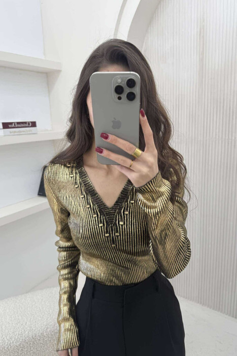 TRIKO E SHNDRITSHME PËR FEMRA NË NGJYRËN GOLD - 2