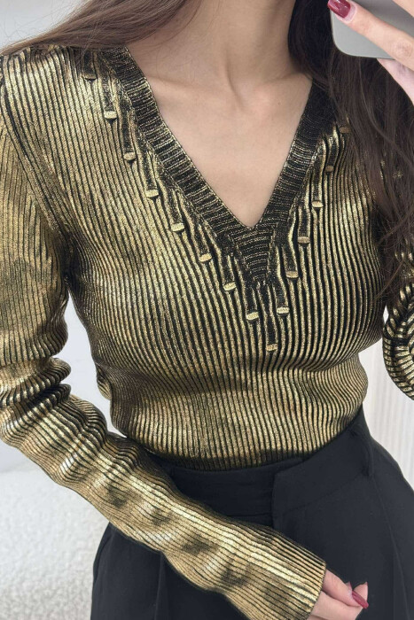 TRIKO E SHNDRITSHME PËR FEMRA NË NGJYRËN GOLD - 4