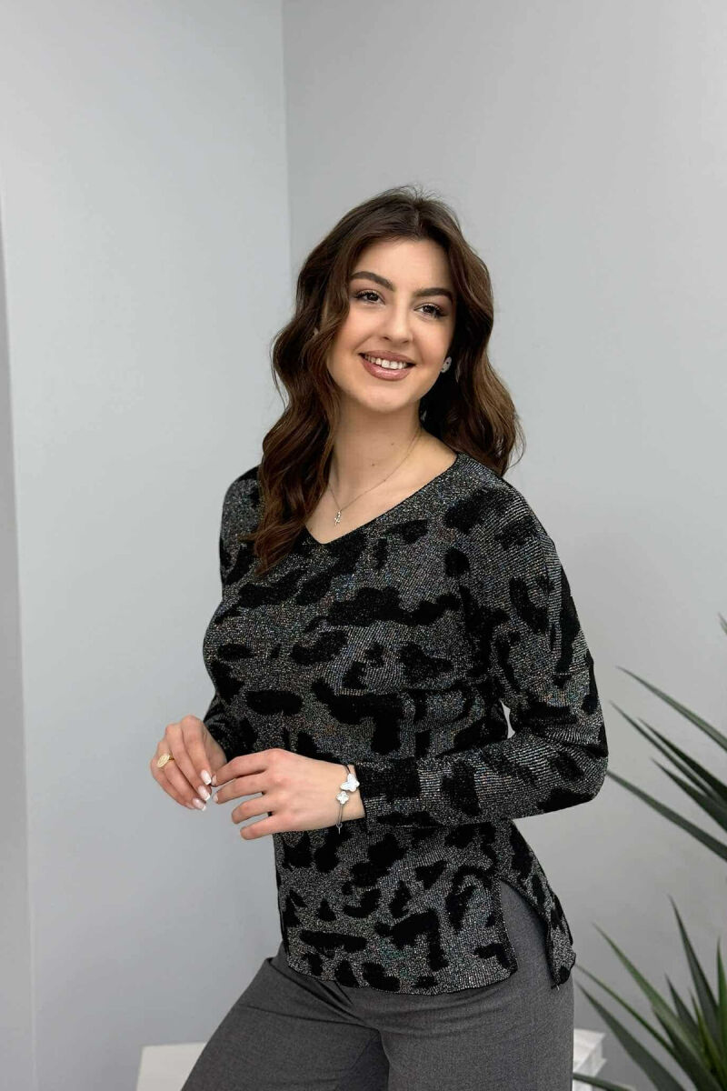TRIKO ME MATERIAL TË SHNDRITSHËM PËR FEMRA NË NGJYRËN E ZEZË - 2