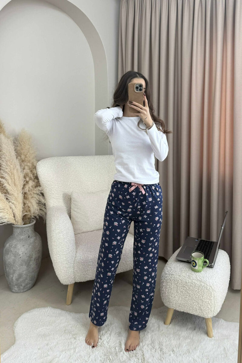 TUTA ME DIZAJN ME LULE DHE ME DETAJIN E FJONGOS PER FEMRA NE NGJYRE BLU TE ERRET - 2