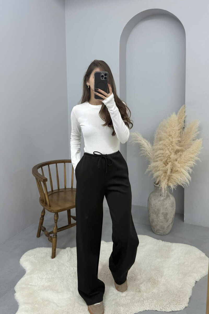 TUTA NJE NGJYRESHE ME BEL ELASTIK PER FEMRA NE NGJYRE TE ZEZE - 2