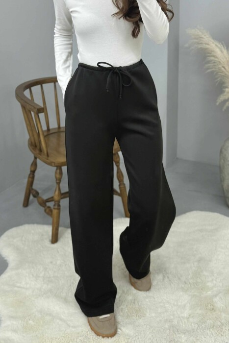 TUTA NJE NGJYRESHE ME BEL ELASTIK PER FEMRA NE NGJYRE TE ZEZE - 3