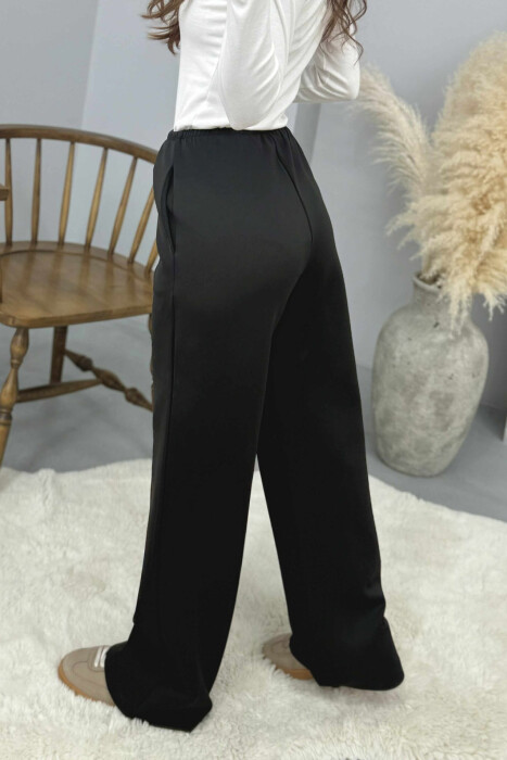 TUTA NJE NGJYRESHE ME BEL ELASTIK PER FEMRA NE NGJYRE TE ZEZE - 4