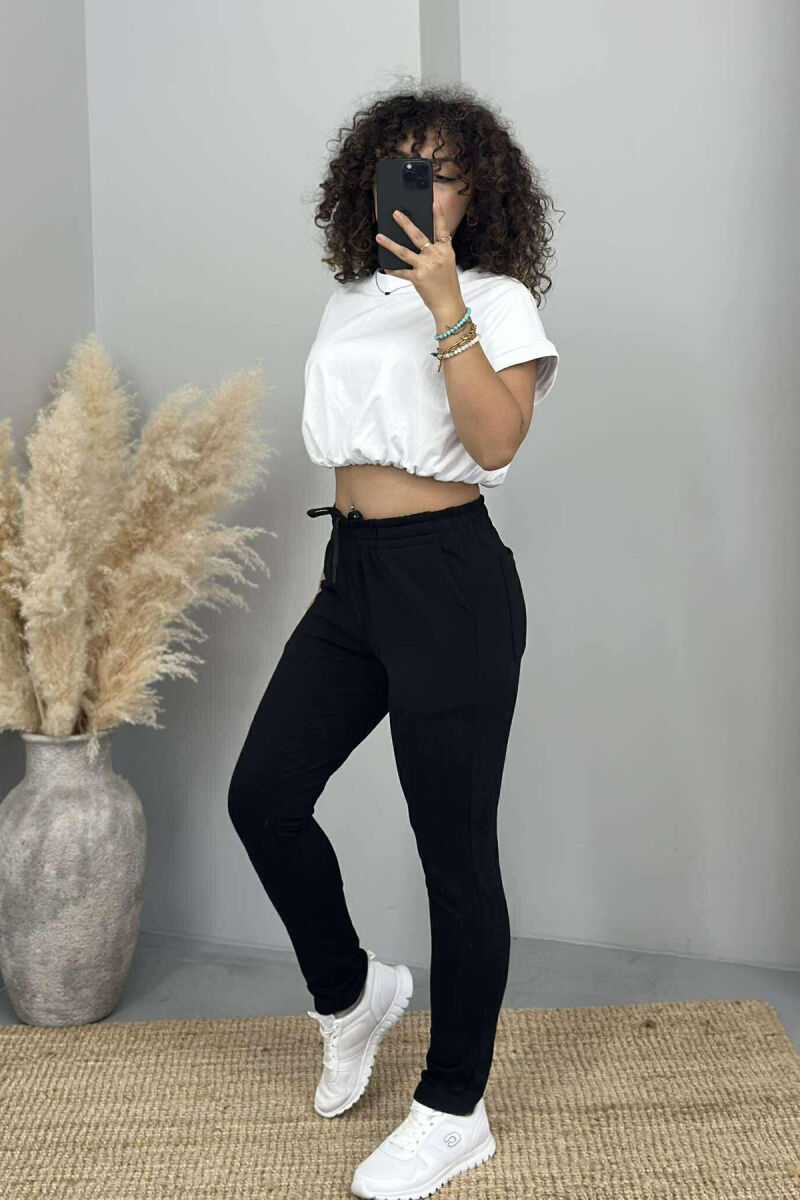 TUTA NJË NGJYRËSHE ME BEL ELASTIK PËR FEMRA NË NGJYRË TË ZEZË - 3