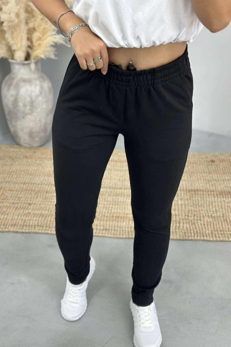 TUTA NJË NGJYRËSHE ME BEL ELASTIK PËR FEMRA NË NGJYRË TË ZEZË - 4