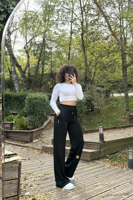 TUTA TË THJESHTA ME BEL ELASTIK PËR FEMRA NË NGJYRË TË ZEZË - 3