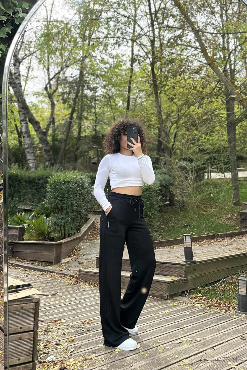 TUTA TË THJESHTA ME BEL ELASTIK PËR FEMRA NË NGJYRË TË ZEZË - 3