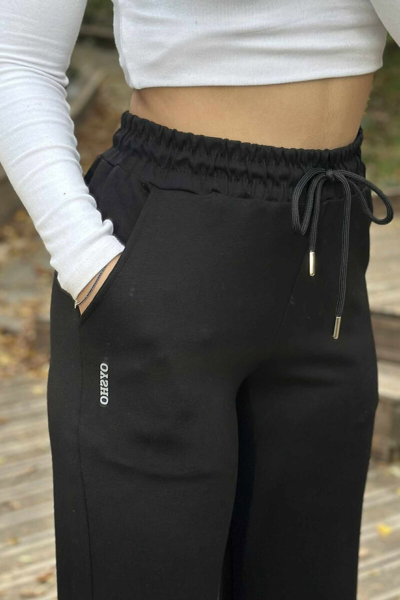 TUTA TË THJESHTA ME BEL ELASTIK PËR FEMRA NË NGJYRË TË ZEZË - 5