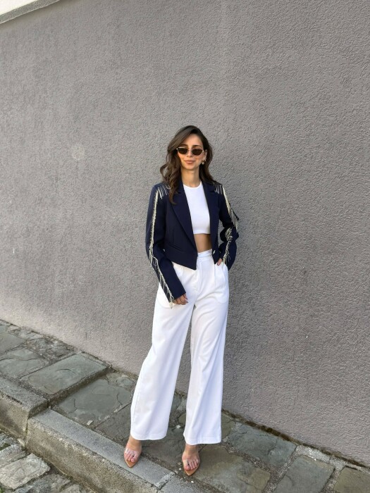 XHAKETE E SHKURTER ME DETAJIN E GUREVE TE SHNDRITSHEM PER FEMRA NE NGJYRE BLU TE ERRET - 2