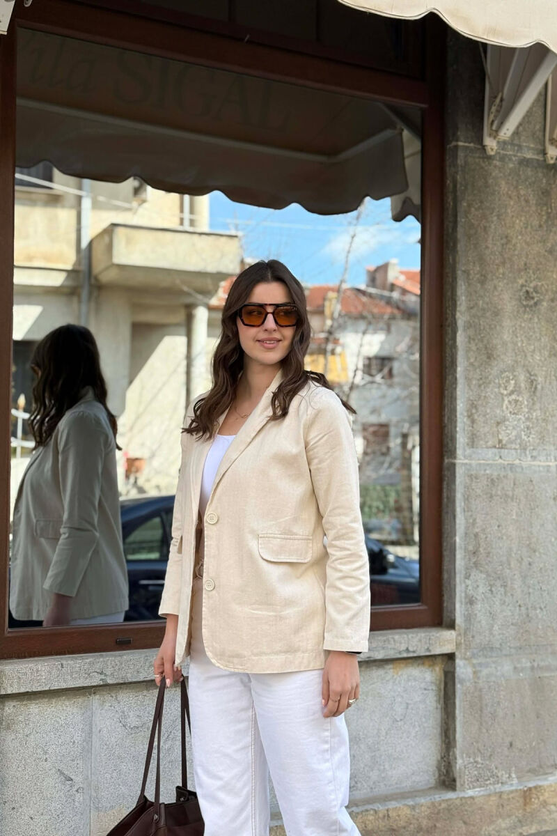 XHAKETE E THJESHTE NJE NGJYRESHE PER FEMRA NE NGJYRE KREM - 1