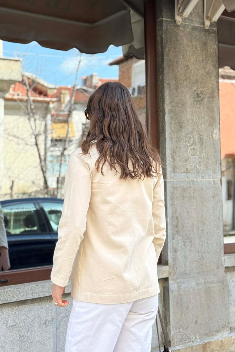 XHAKETE E THJESHTE NJE NGJYRESHE PER FEMRA NE NGJYRE KREM - 2