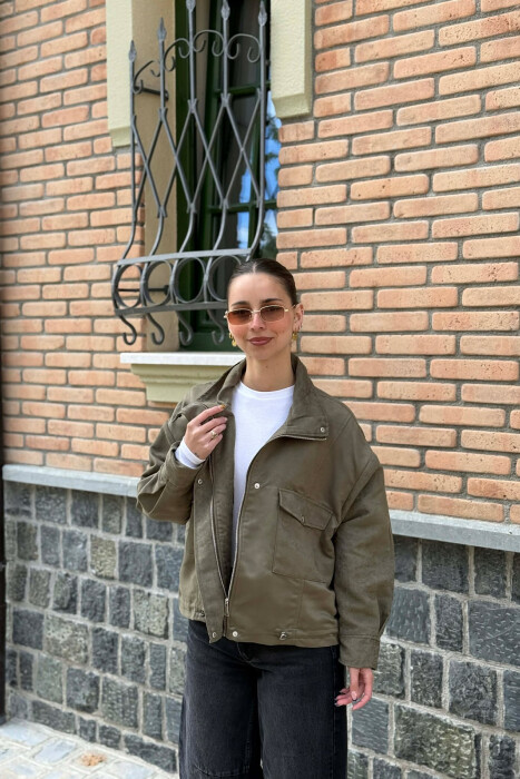 XHAKETE ME BUTONA DHE ZINXHIR PER FEMRA NE NGJYRE JESHILE - 1