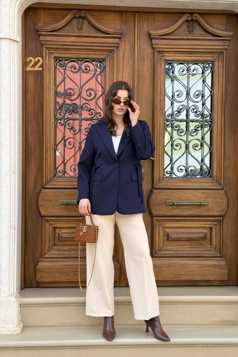 XHAKETE NJE NGJYRESHE ME BUTONA PER FEMRA NE NGJYRE BLU - 6