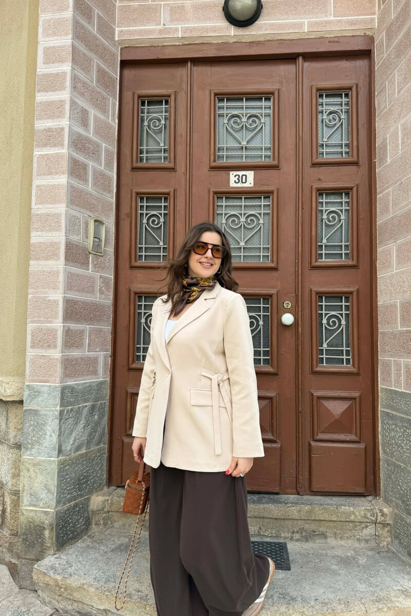 XHAKETE NJE NGJYRESHE ME BUTONA PER FEMRA NE NGJYRE KREM - 6