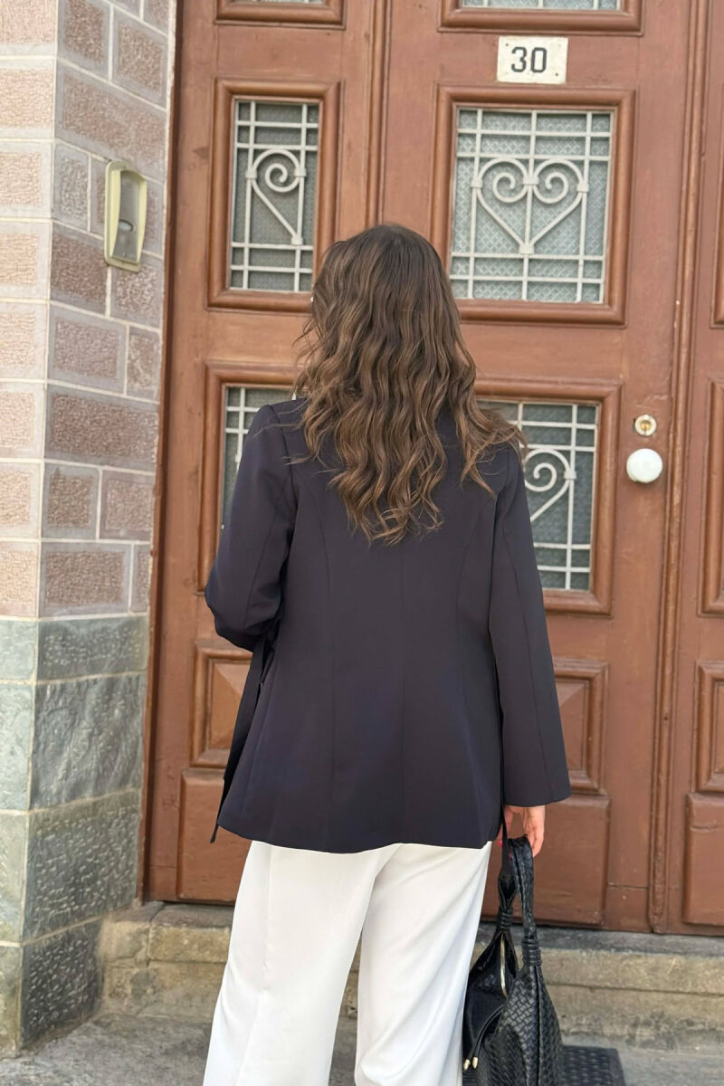 XHAKETE NJE NGJYRESHE ME BUTONA PER FEMRA NE NGJYRE TE ZEZE - 3